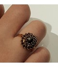 Bague grenat ovale fleur griffée