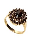 Bague grenat ovale fleur griffée